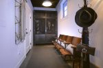 Fun entry room with vintage stadium seats